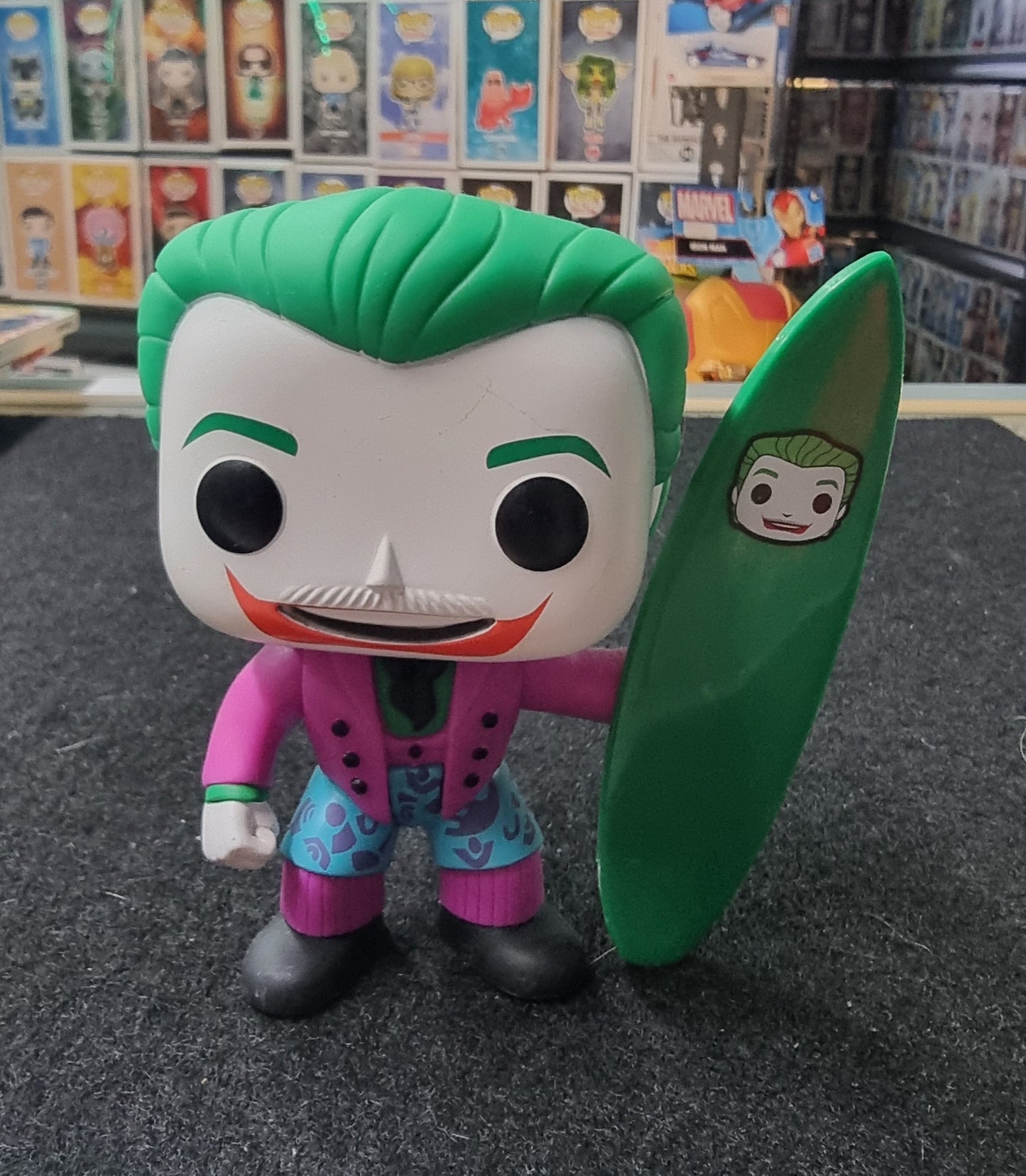 FUNKO POP BATMAN SURFS UP THE JOKER #134