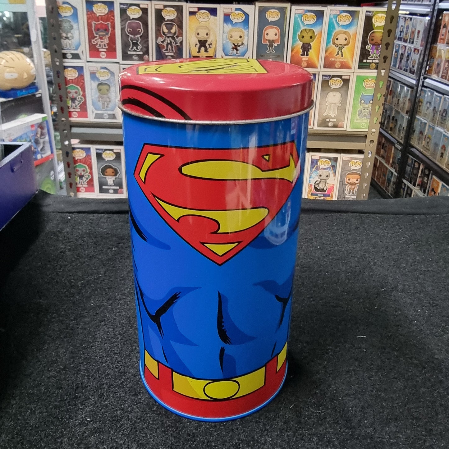 SUPERMAN COLLECTORS MONEY TIN WITH COLLECTOR GLASS INSIDE