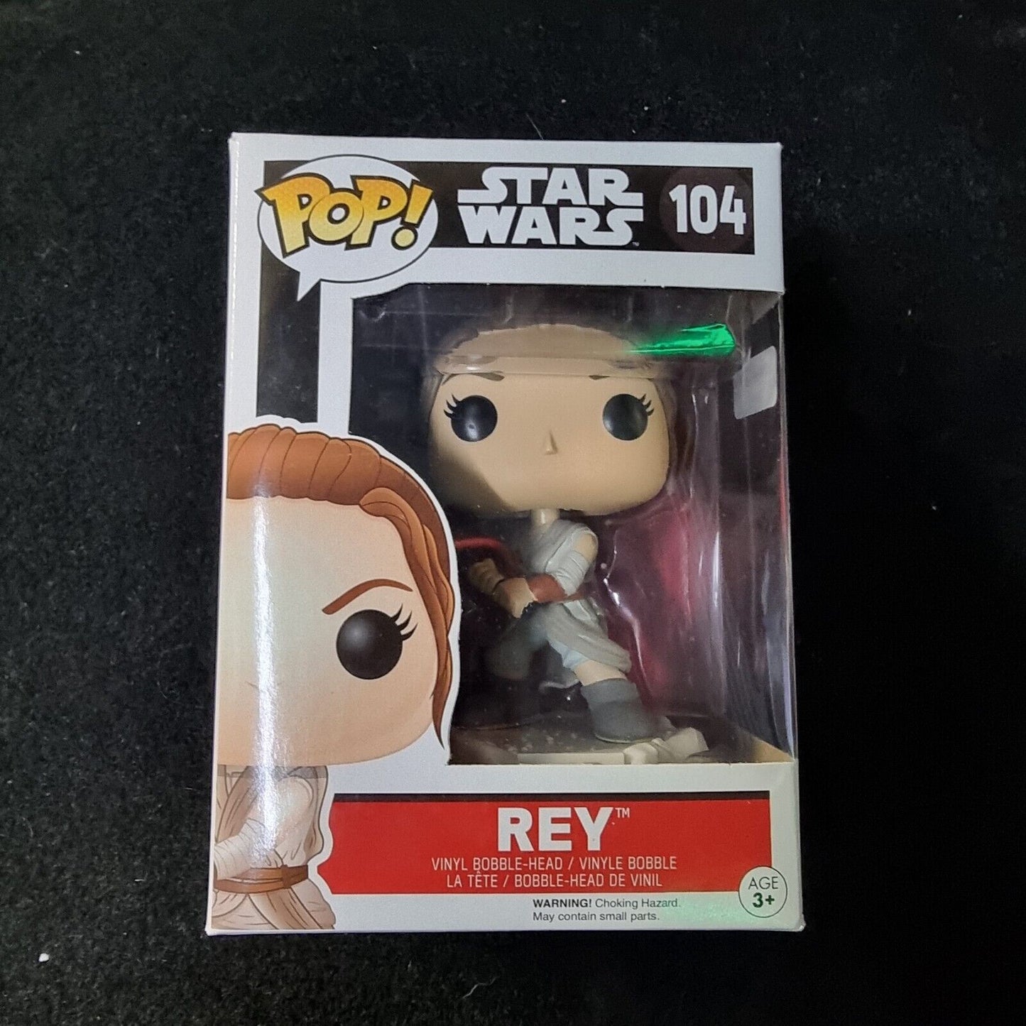 Funko Pop! Vinyl: Star Wars - Rey (w/ Lightsaber) #104