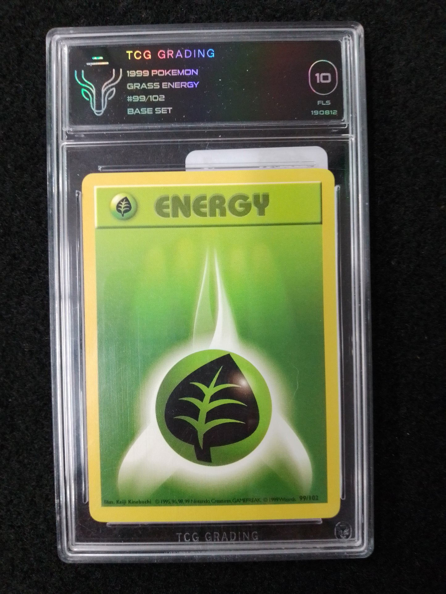 POKEMON GRASS ENERGY #99/102 1999 - TCG GRADED CARD - N09420