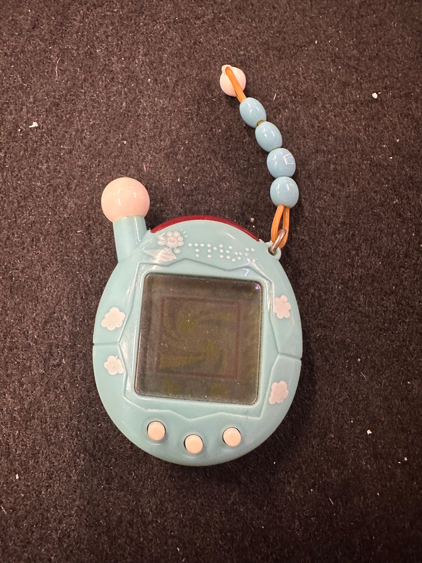 TAMAGOTCHI BLUE CLOUDS