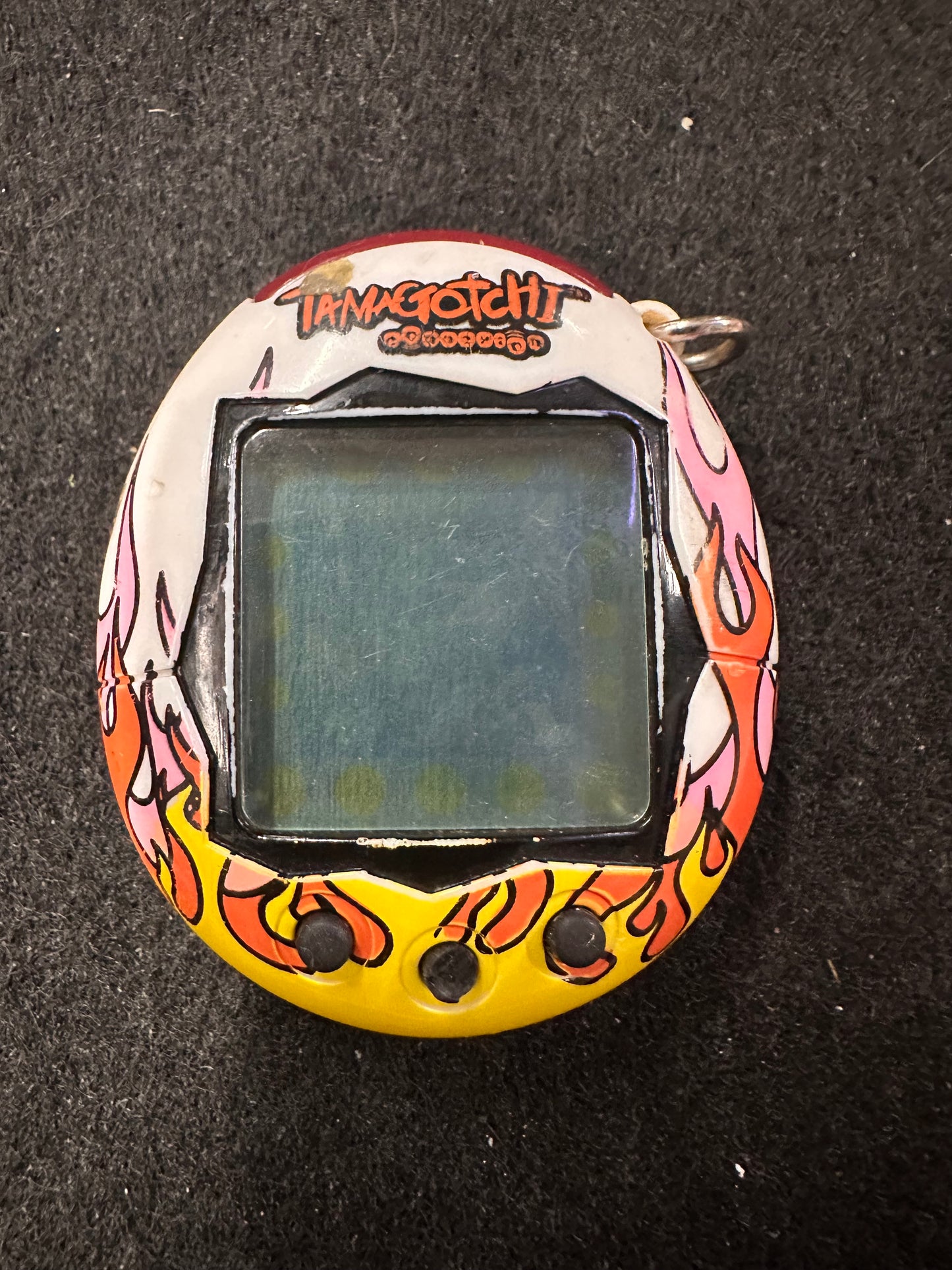 TAMAGOTCHI WITH FLAMES