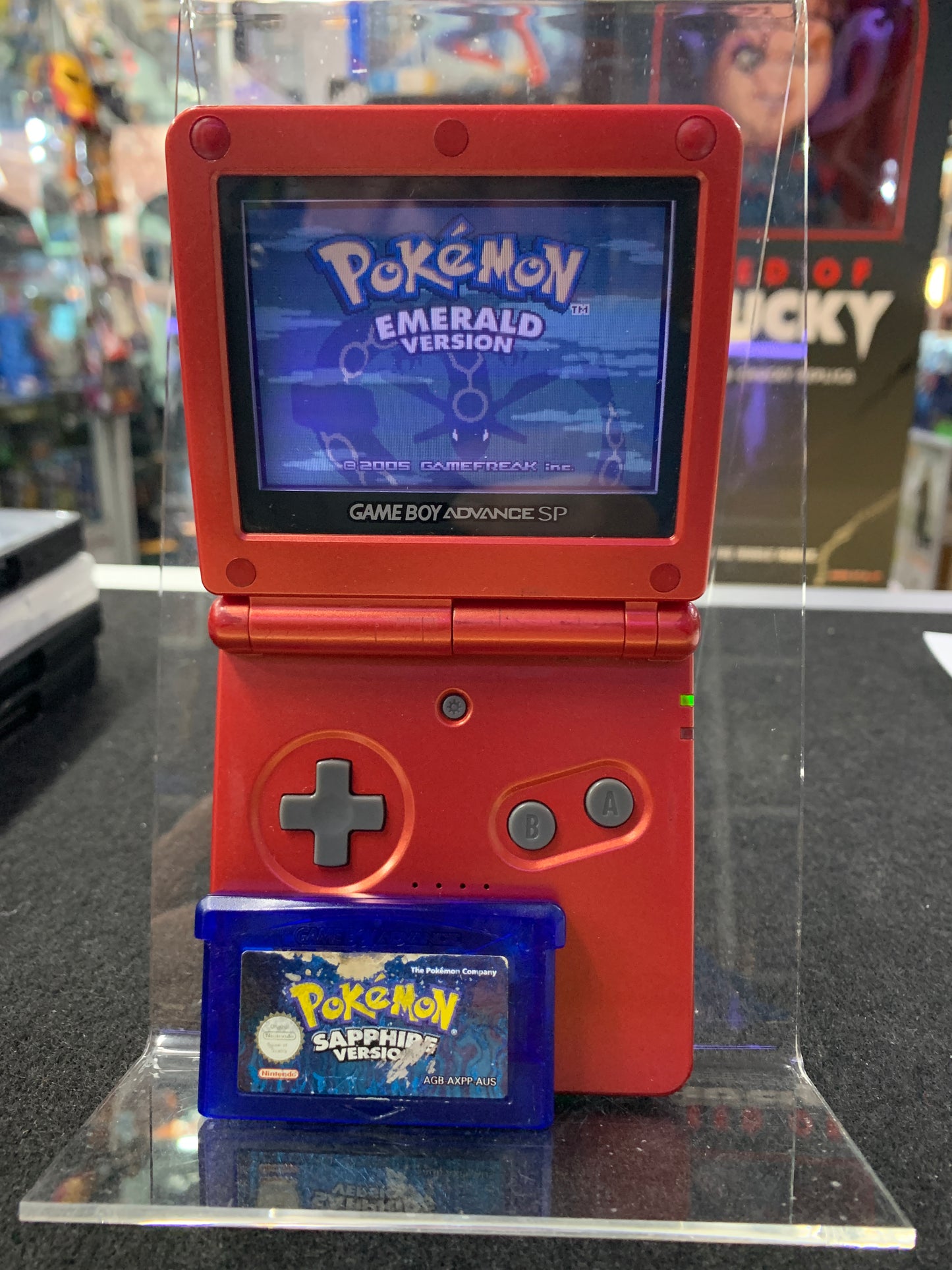 Gameboy advance sp 2002 with two Pokémon games tested