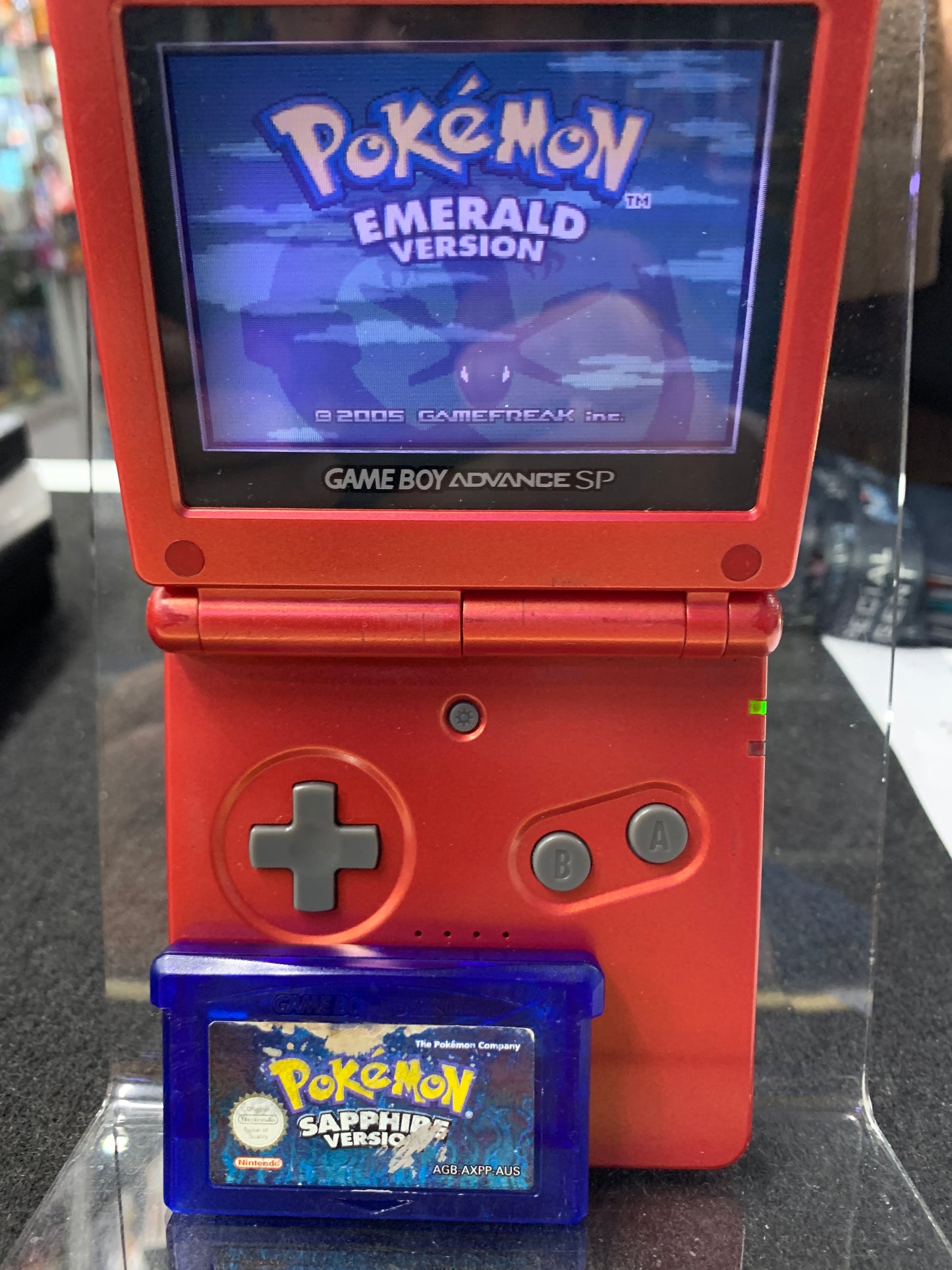 Gameboy advance sp 2002 with two Pokémon games tested