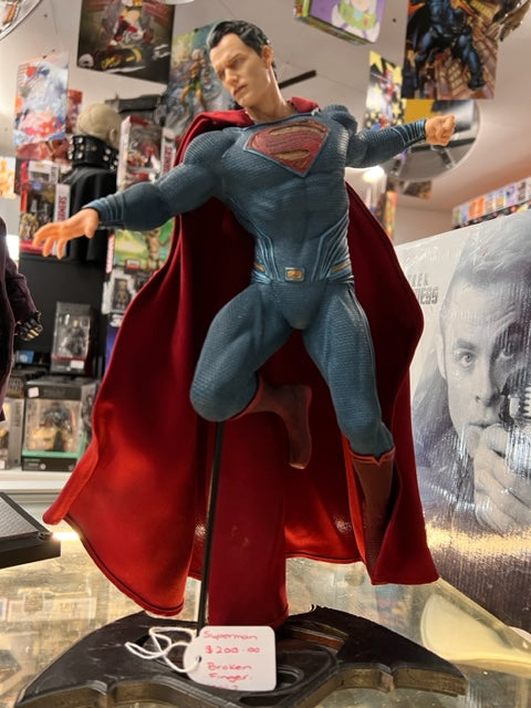 Description Statue of Henry Cavill made up as DC Rebirth Superman.